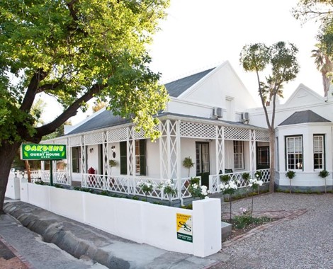 Sheltered under oak trees on the main tourist route, our Guest House is one of the oldest and finest examples of architecture from the early days in Oudtshoorn
