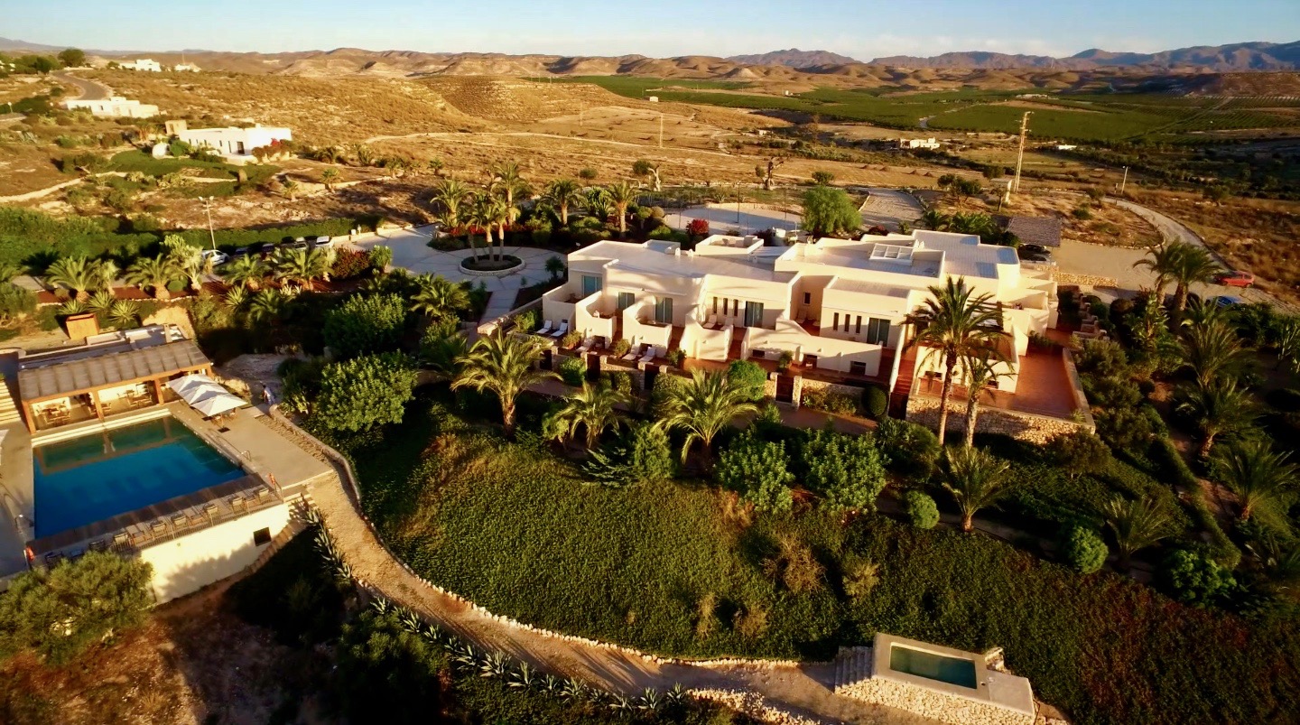 A short distance from the beach, and with panoramic views of mountains and sea, this boutique hotel is a haven of tranquillity